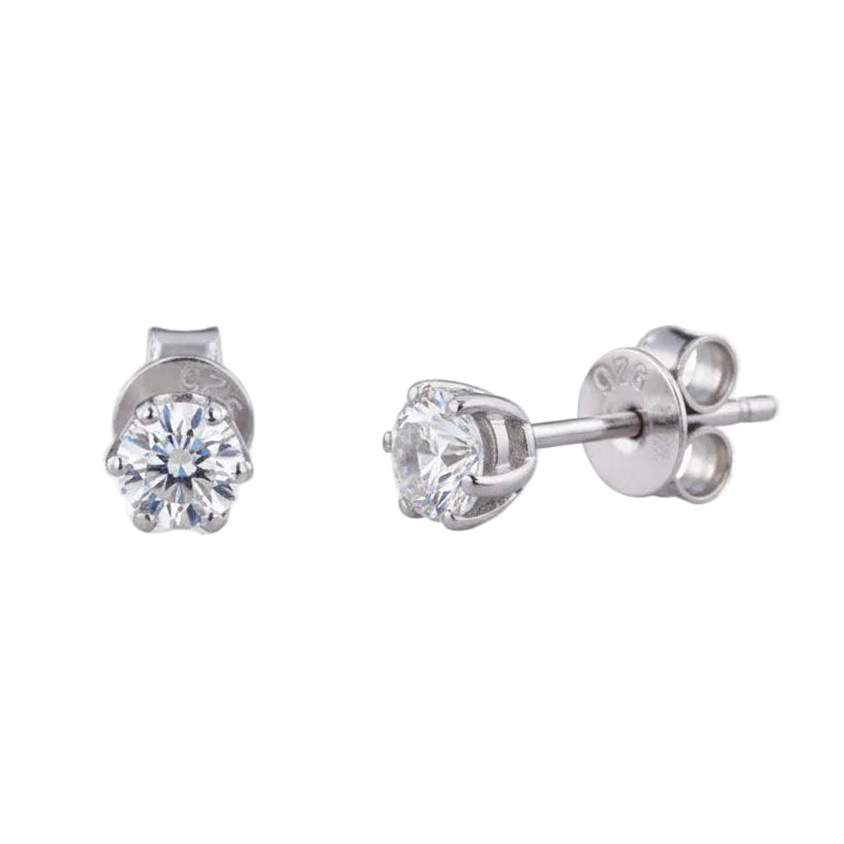 Pair of silver stud earrings with clear gemstones on a transparent background