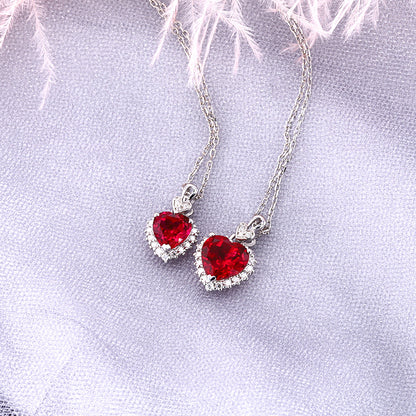 pigeon blood lab ruby heart necklaces 1ct and 2ct moissanite halo sterling silver – side by side UK