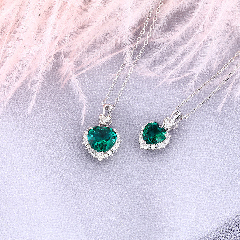 Zambian lab emerald heart necklaces 1ct and 2ct moissanite halo sterling silver – side by side UK