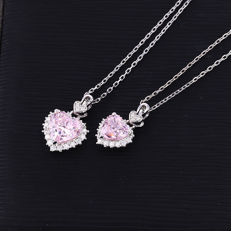 pink crushed ice CZ heart necklaces 1ct and 2ct moissanite halo sterling silver – side by side UK