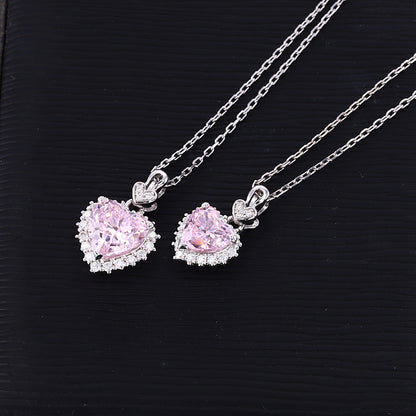 pink crushed ice CZ heart necklaces 1ct and 2ct moissanite halo sterling silver – side by side UK