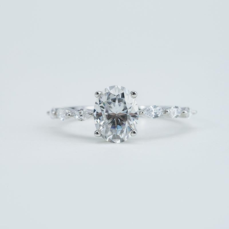 Diamond ring on a light gray background