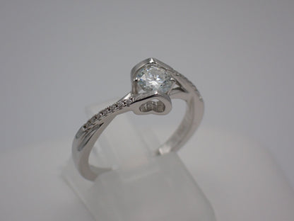 Twisted Pavé Solitaire Moissanite Ring – 0.5ct -  Mara & Co UK