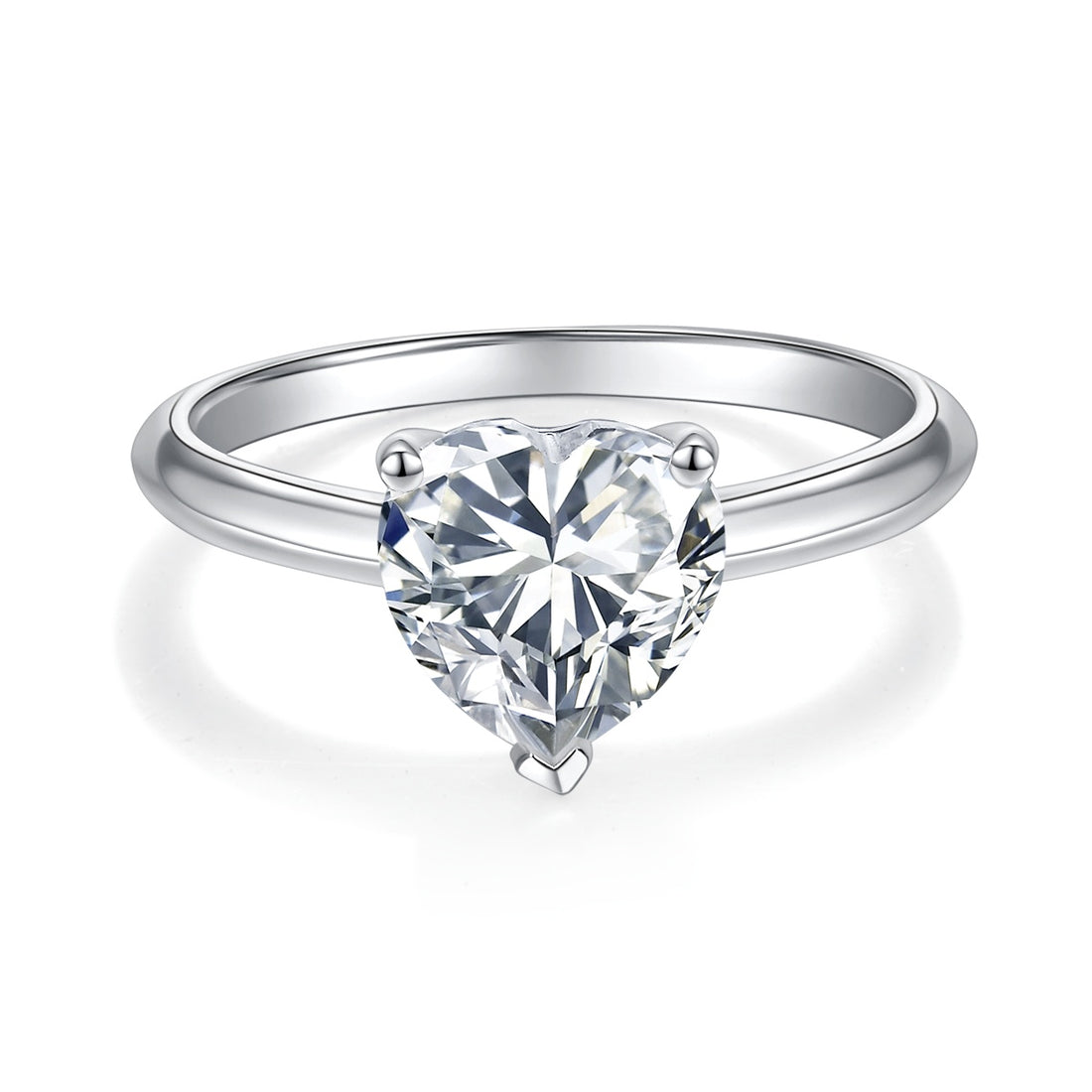Heart-shaped diamond ring on a white background