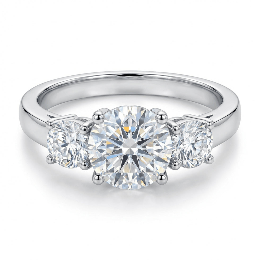 Silver ring with three diamonds on a white background