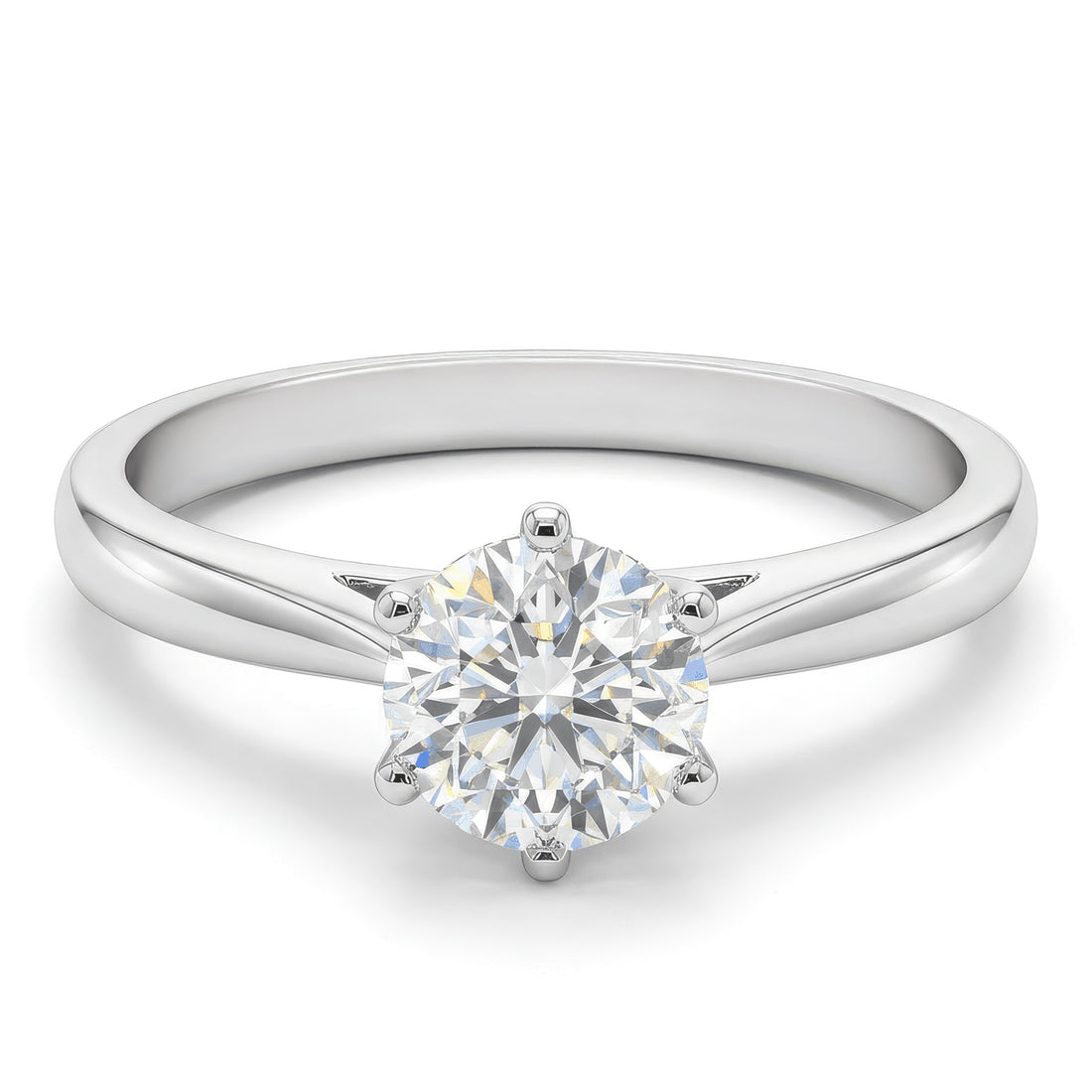 Silver ring with a diamond on a white background