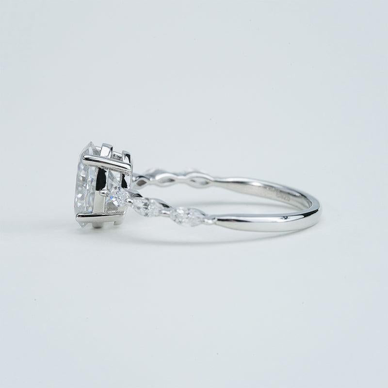 Diamond ring on a light gray background