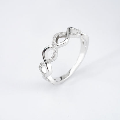 Infinity Twist Moissanite Band – 0.20ct Total, 29 x 1.1mm DEF, Sterling Silver