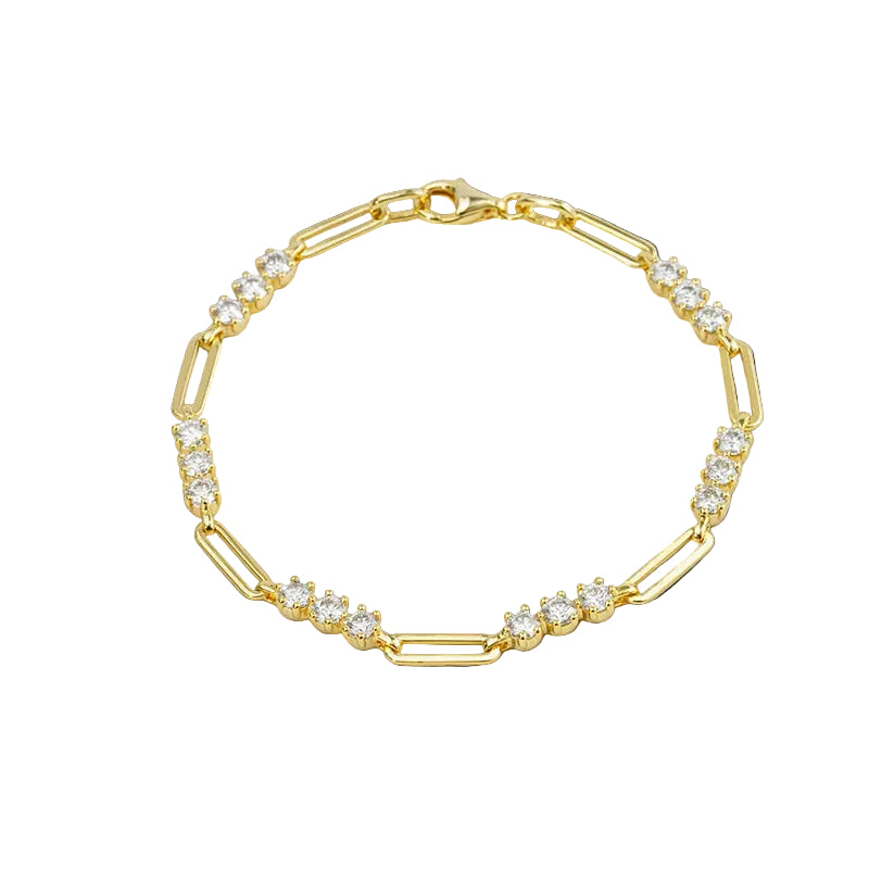 Gold bracelet with clear stones