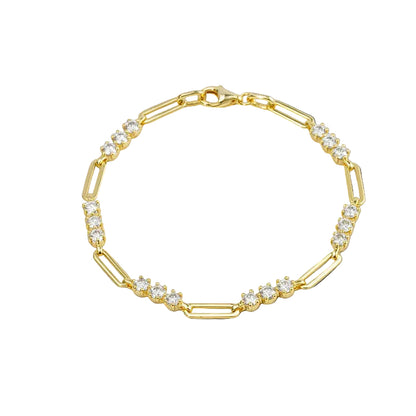 Gold bracelet with clear stones
