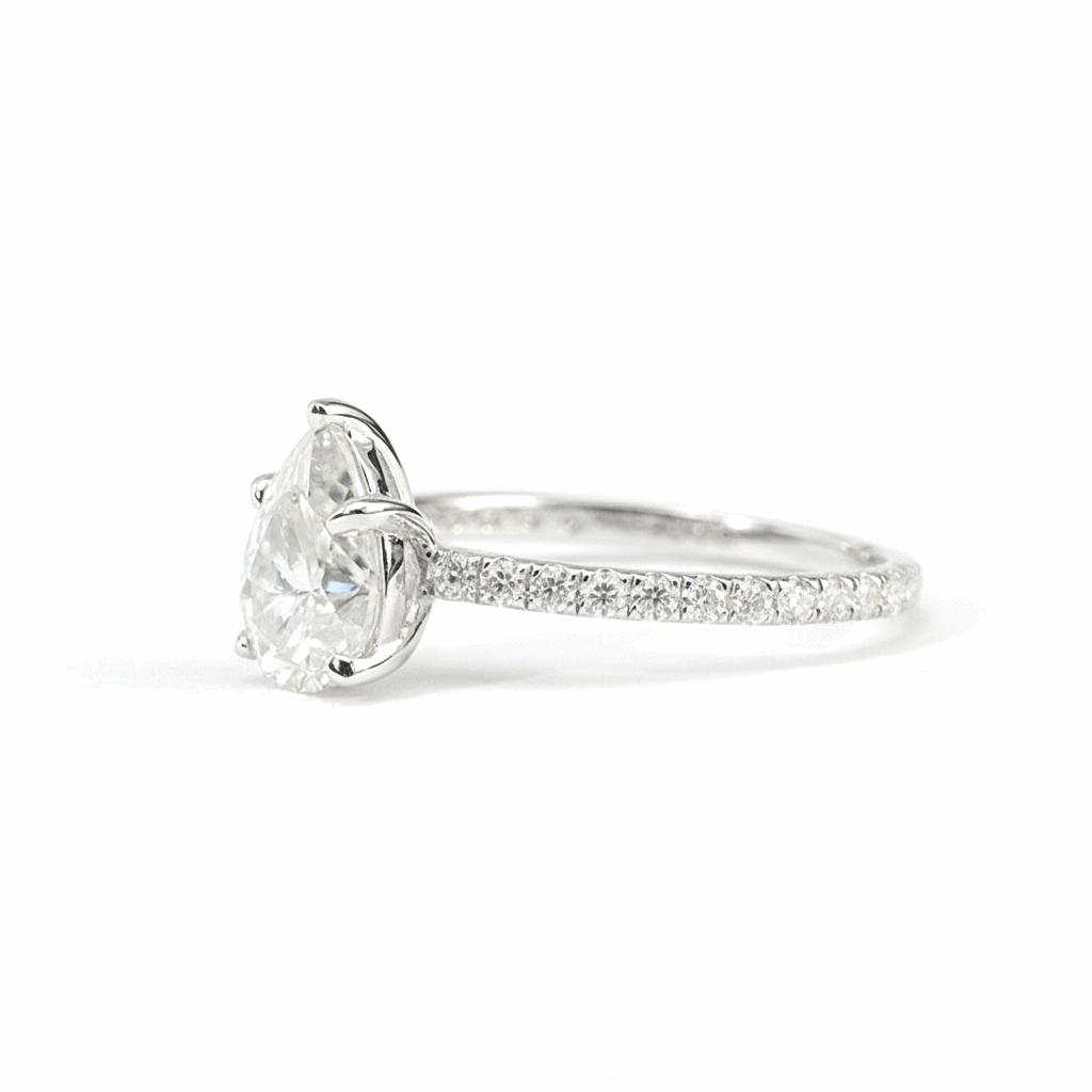 Pear Moissanite Ring with Pavé Band