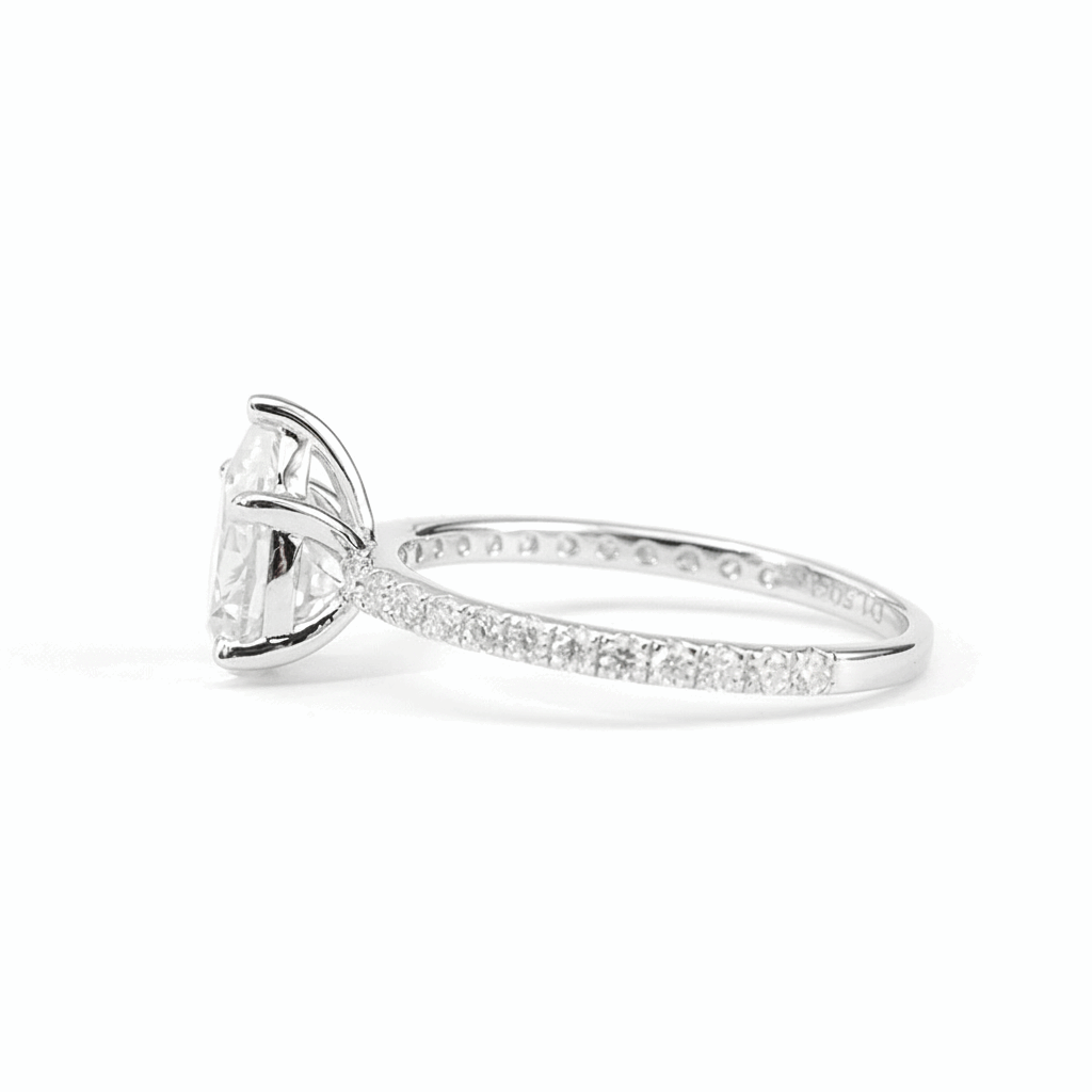Pear Moissanite Ring with Pavé Band
