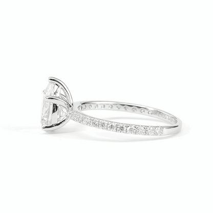 Pear Moissanite Ring with Pavé Band